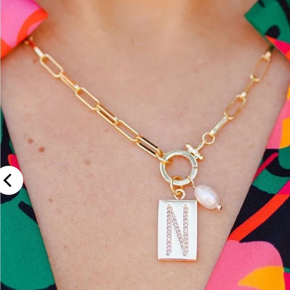 Gold-Toned Necklace with Elongated Chain and Pendant